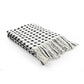 Against a white background, the folded Black and White Cotton Bedcover Throw you can buy online at Sukham Home, a sustainable furniture, kitchen & dining and home decor store in Kolkata, India