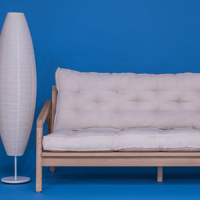 Other arm and side of Bliss Sofa, a wooden cushioned midcentury sofa you can buy online at Sukham Home, a sustainable furniture, kitchen & dining and home decor store in Kolkata, India