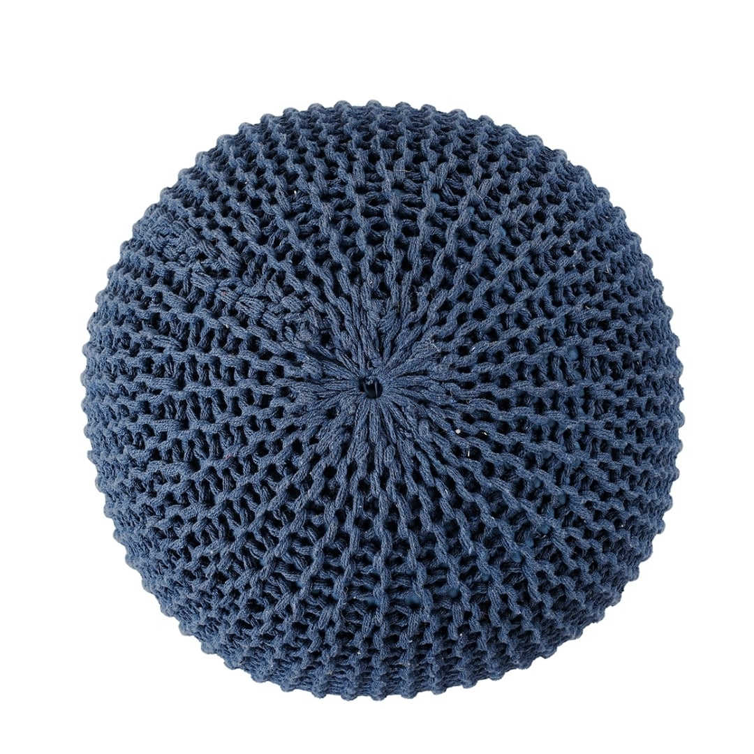 Against a white background, the top view of the Blue Knitted Pouf, a navy blue ottoman made from cotton, available at Sukham Home, a sustainable furniture, kitchen & dining and home decor store in Kolkata, India