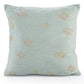 Against a white background, the Minimalist Threaded Cushion, a square blue embroidered accent pillow available at Sukham Home, a sustainable furniture, kitchen & dining and home decor store in Kolkata, India