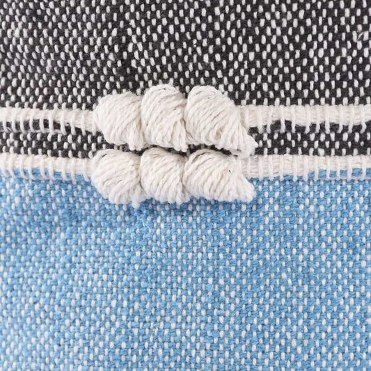 Close up of the tufting and texture on the Geometric Details Blue Pouf, an ottoman made from cotton, available at Sukham Home, a sustainable furniture, kitchen & dining and home decor store in Kolkata, India