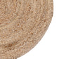 Close up of the corners and weaving pattern of the Braided Round Jute Rug, a circular jute carpet you can buy online at Sukham Home, a sustainable furniture, kitchen & dining and home decor store in Kolkata, India