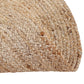 Both sides of the Braided Round Jute Rug, a circular jute carpet you can buy online at Sukham Home, a sustainable furniture, kitchen & dining and home decor store in Kolkata, India
