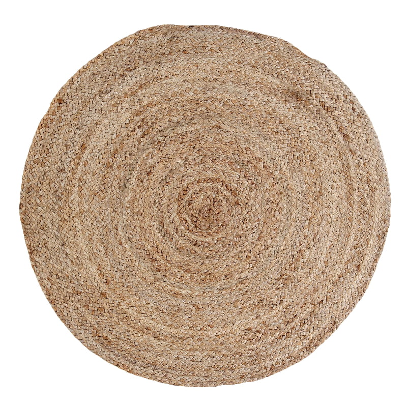 Against a white background, the Braided Round Jute Rug, a circular jute carpet you can buy online at Sukham Home, a sustainable furniture, kitchen & dining and home decor store in Kolkata, India