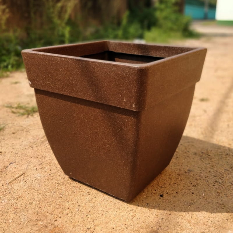 In the Brown Stone finish, the Barca Square, a square stone finish plastic planter that looks like granite available at Sukham Home, a sustainable furniture, gardening and home decor store in Kolkata, India