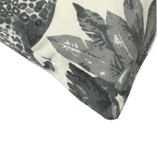 Corner of the Call of the Wild Cushion, a square white and grey jungle-printed accent pillow available at Sukham Home, a sustainable furniture, kitchen & dining and home decor store in Kolkata, India