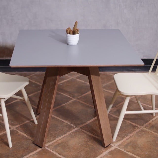 From the top view, the Como, a wooden square table you can buy online at Sukham Home, a sustainable furniture, kitchen & dining and home decor store in Kolkata, India