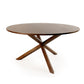 Against a white background, top view of the Compass, a wooden round dining table you can buy online at Sukham Home, a sustainable furniture, kitchen & dining and home decor store in Kolkata, India