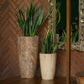 Big Brown Italian Marble finish and small Matte Teak Wood finish in the Cono, a large round tall textured luxury planter made from FRP you can buy online at Sukham Home, a sustainable furniture, gardening and home decor store in Kolkata, India