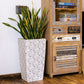 In terrazzo finish, the Cubico, a large square tall textured luxury planter made from FRP you can buy online at Sukham Home, a sustainable furniture, gardening and home decor store in Kolkata, India