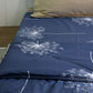 Along with the Dandelion Bedsheet, the Dandelion Blue-Grey Comforter, a blue and beige printed king size cotton quilt you can buy online at Sukham Home, a sustainable furniture, gardening and home decor store in Kolkata, India