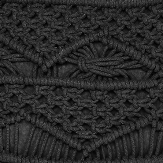 Close up of the texture and design of the Dark Grey Macrame Pouf, a grey ottoman made from cotton, available at Sukham Home, a sustainable furniture, kitchen & dining and home decor store in Kolkata, India