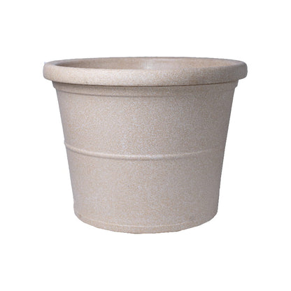 Against a white background, the Cream Stone Duro, a circular stone finish plastic planter that looks like granite available at Sukham Home, a sustainable furniture, gardening and home decor store in Kolkata, India