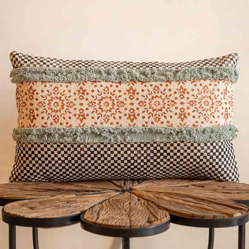 Front view of the Elysian Fringed Cushion, a rectangle handpainted and tufted accent pillow you can buy online at Sukham Home, a sustainable furniture, kitchen & dining and home decor store in Kolkata, India