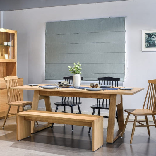 Used in a dining set, the Oak Natural Ever Bench, a solid wood dining seat you can buy online at Sukham Home, a sustainable furniture and home decor store in Kolkata, India