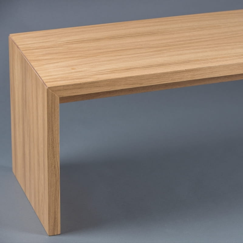 Close up of the edging on the Oak Natural Ever Bench, a solid wood dining seat you can buy online at Sukham Home, a sustainable furniture and home decor store in Kolkata, India