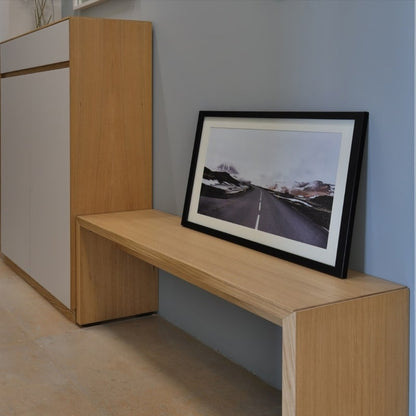 Used as an entryway bench, the Ever Bench, a solid wood dining seat you can buy online at Sukham Home, a sustainable furniture and home decor store in Kolkata, India