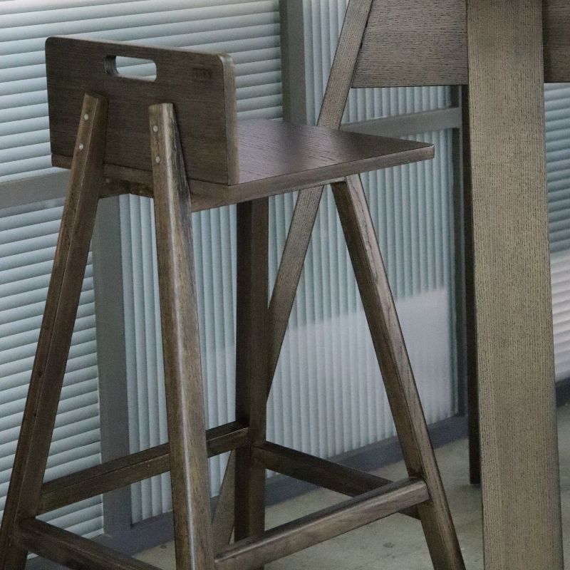 The Ash Grey Flamingo Bar Stool, a solid wood high bar chair you can buy online at Sukham Home, a sustainable furniture and home decor store in Kolkata, India