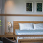 Slatted headboard in Oak Natural finish of the Fred, a wooden bed with a wood slatted framed headboard you can buy online at Sukham Home, a sustainable furniture, kitchen & dining and home decor store in Kolkata, India