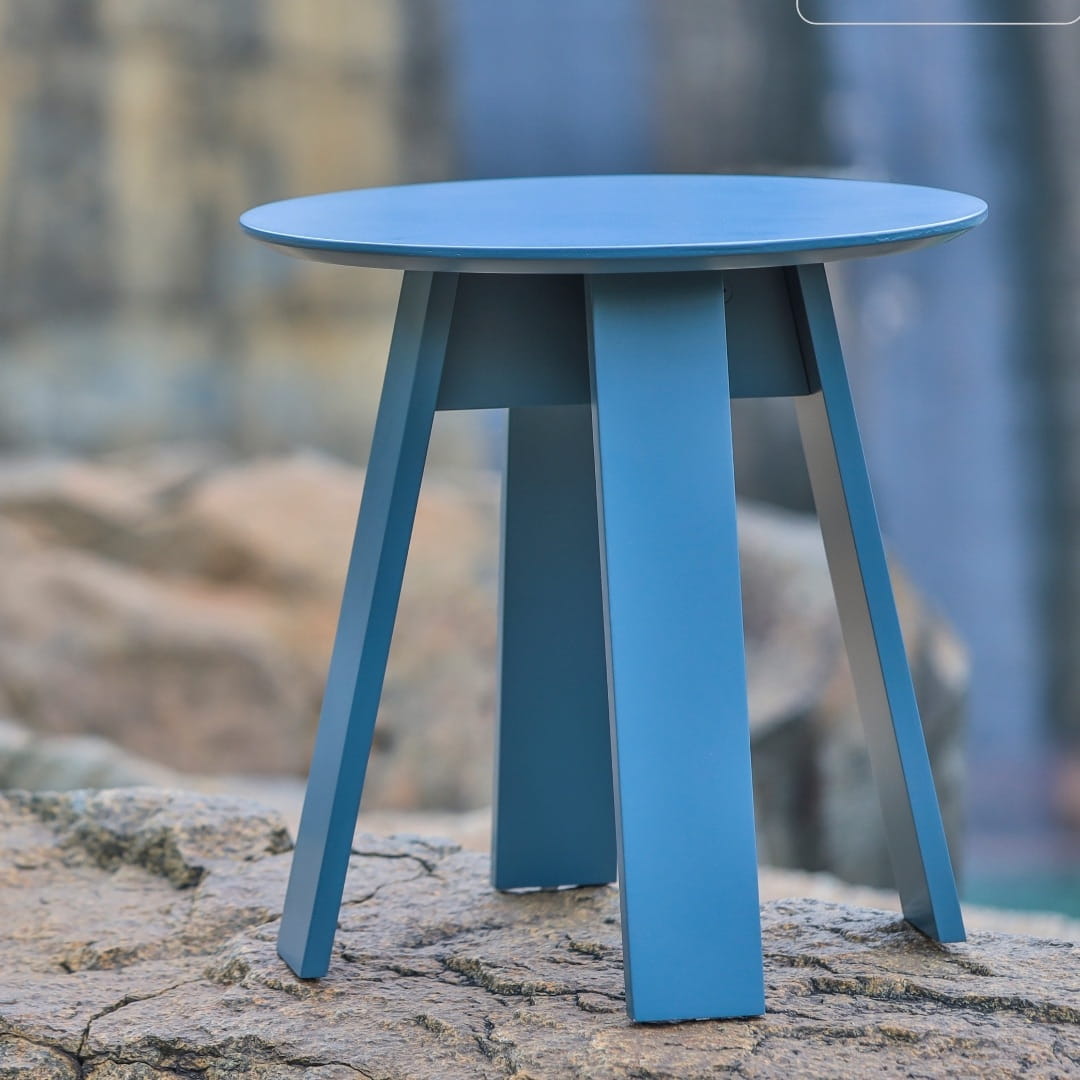 In Stormy grey, the small Full Moon Centre Table, a round wooden coffee and centre table you can buy online at Sukham Home, a sustainable furniture, kitchen & dining and home decor store in Kolkata, India