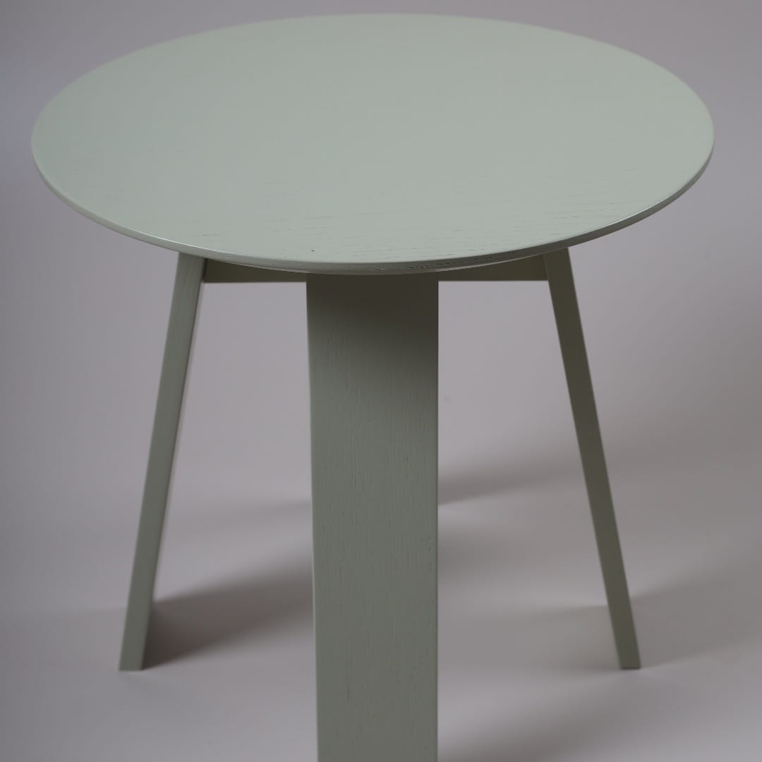 In Dove Grey-Beige, the Full Moon Centre Table, a round wooden coffee and centre table you can buy online at Sukham Home, a sustainable furniture, kitchen & dining and home decor store in Kolkata, India