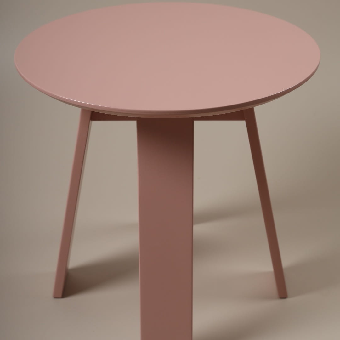 In Rose Quartz, the small Full Moon Centre Table, a round wooden coffee and centre table you can buy online at Sukham Home, a sustainable furniture, kitchen & dining and home decor store in Kolkata, India