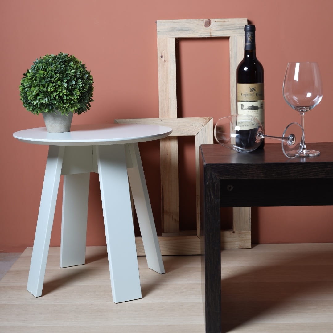 Placed in an arrangement, Oak Snow White Full Moon Centre Table, a round wooden coffee and centre table you can buy online at Sukham Home, a sustainable furniture, kitchen & dining and home decor store in Kolkata, India