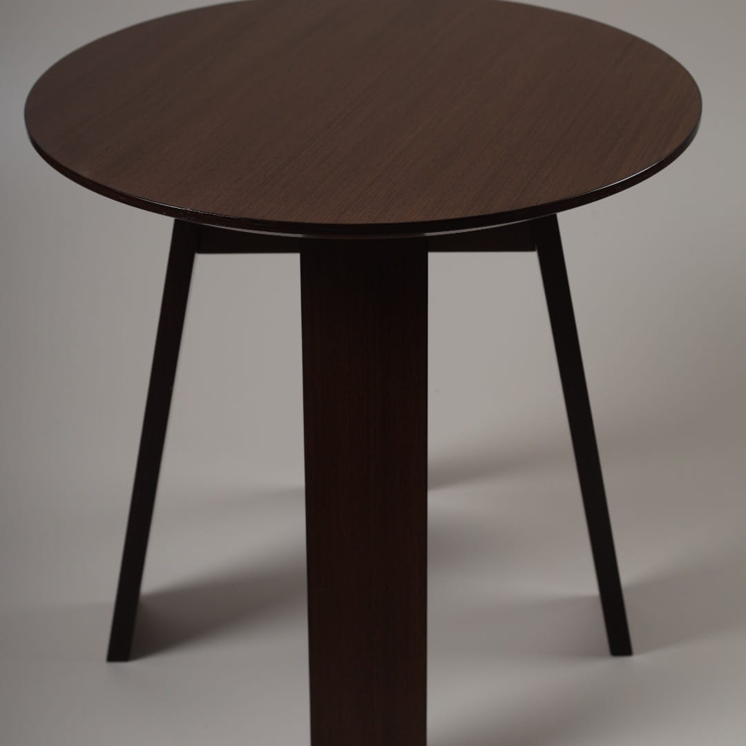 In Walnut Natural, the Full Moon Centre Table, a round wooden coffee and centre table you can buy online at Sukham Home, a sustainable furniture, kitchen & dining and home decor store in Kolkata, India