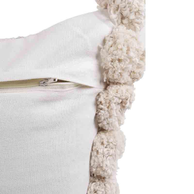 Back zipper of the Graphite Cushions, a set of two white and grey linen accent pillows with pom poms you can buy online at Sukham Home, a sustainable furniture, kitchen & dining and home decor store in Kolkata, India