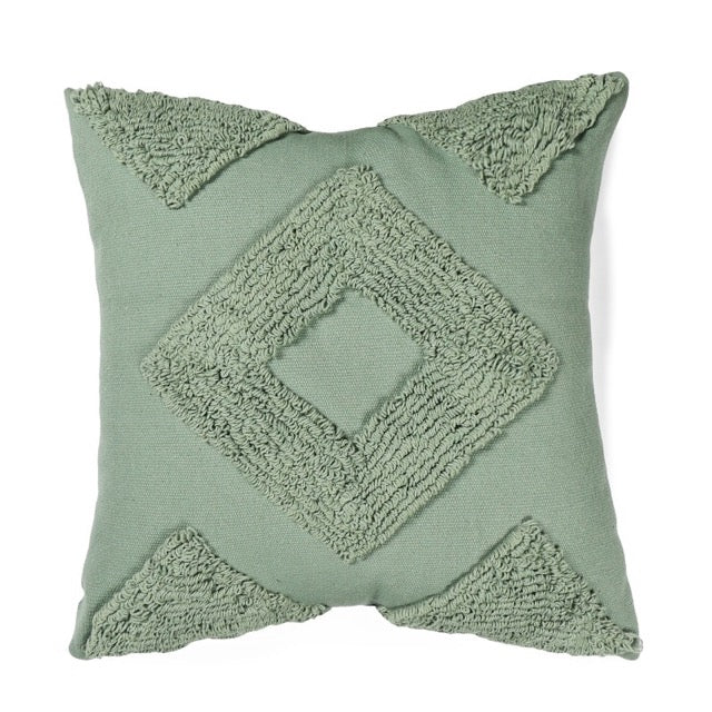 Against a white background, the Green Loop Tufted Cushion, a square green accent pillow available at Sukham Home, a sustainable furniture, kitchen & dining and home decor store in Kolkata, India