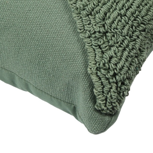 Corner of the Green Loop Tufted Cushion, a square green accent pillow available at Sukham Home, a sustainable furniture, kitchen & dining and home decor store in Kolkata, India