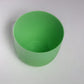 Top view of green Verona, a round colourful indoor planter made from plastic that you can buy online at Sukham Home, a sustainable furniture, gardening and home decor store in Kolkata, India