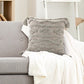 Placed on a sofa, the Grey Diamond Tufted Cushion, a square grey accent pillow available at Sukham Home, a sustainable furniture, kitchen & dining and home decor store in Kolkata, India