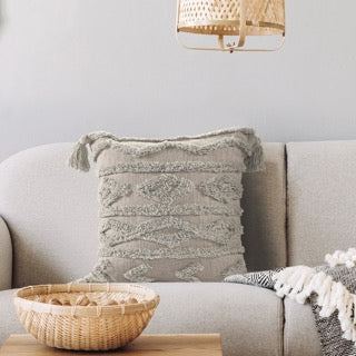 Arranged on a grey sofa, the Grey Diamond Tufted Cushion, a square grey accent pillow available at Sukham Home, a sustainable furniture, kitchen & dining and home decor store in Kolkata, India