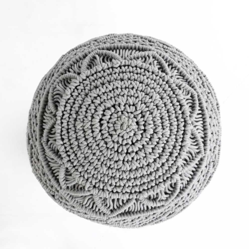 Against a white background, top view of the Grey Macrame Pouf, a grey ottoman made from cotton, available at Sukham Home, a sustainable furniture, kitchen & dining and home decor store in Kolkata, India