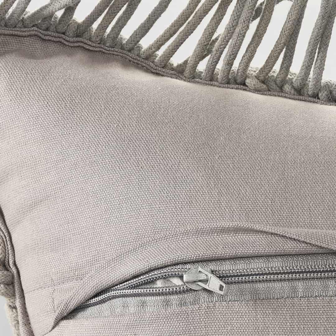 Close up of the zip of the Grey Macrame Cushion, a rectangle accent pillow you can buy online at Sukham Home, a sustainable furniture, kitchen & dining and home decor store in Kolkata, India