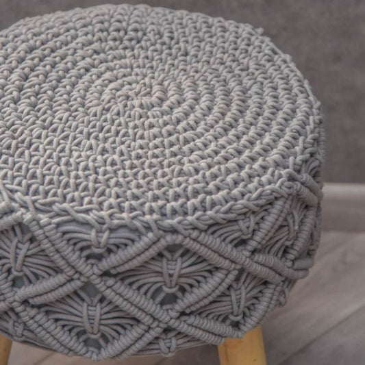 Close up of the texture and design on the Grey Macrame Stool, a grey ottoman made from cotton and mango wood, available at Sukham Home, a sustainable furniture, kitchen & dining and home decor store in Kolkata, India