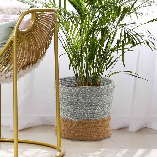 Large basket in the Grey Basket Set, a set of 3 grey jute & cotton baskets you can buy online at Sukham Home, a sustainable furniture, kitchen & dining and home decor store in Kolkata, India