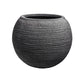 Against a white background, the Grey Stone Rib Bowl, a round textured luxury planter made from FRP you can buy online at Sukham Home, a sustainable furniture, gardening and home decor store in Kolkata, India