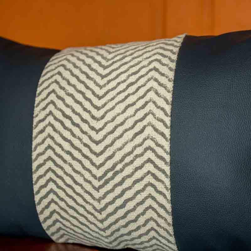 Close up of the texture on the Hailey Cushion, a black leatherette cotton handpainted rectangle accent pillow you can buy online at Sukham Home, a sustainable furniture, kitchen & dining and home decor store in Kolkata, India