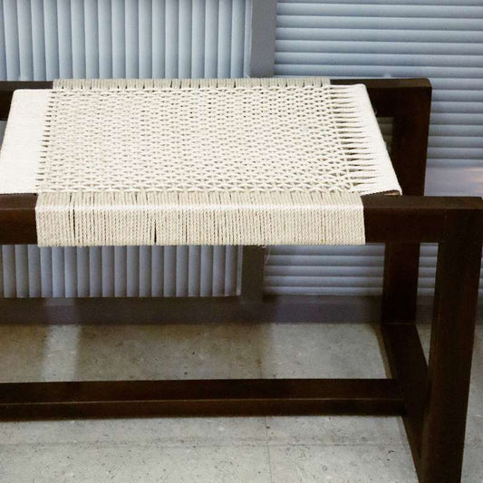 Close up of he weaving pattern on the Jodhpur Bench, a cotton and sheesham seat woven in Rajasthan, available at Sukham Home, a sustainable furniture, kitchen & dining and home decor store in Kolkata, India