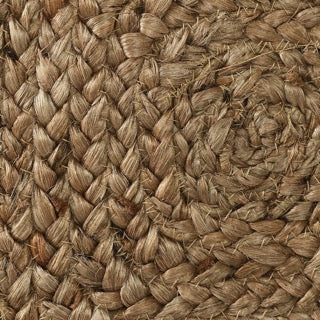 Close up of the braids and stitches of the Jute Square Floor Cushion, a square braided accent pillow, available at Sukham Home, a sustainable furniture, kitchen & dining and home decor store in Kolkata, India