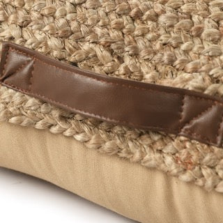 Close up of the faux leather of the Jute Square Floor Cushion, a square braided accent pillow, available at Sukham Home, a sustainable furniture, kitchen & dining and home decor store in Kolkata, India