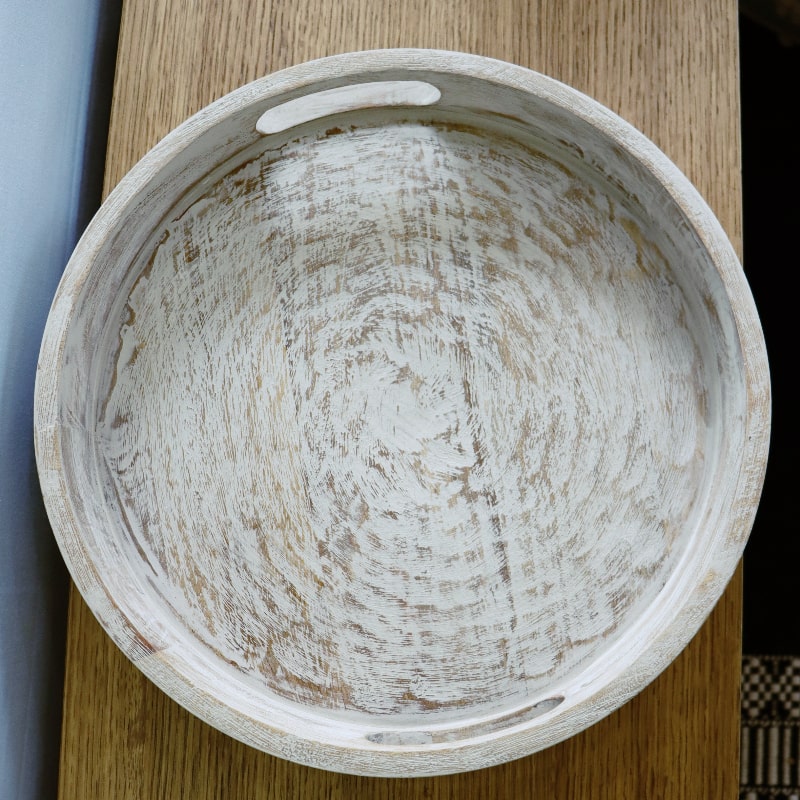 Top view of the Kutch White Wooden Tray, a solid wood patina white platter and serve ware you can buy online at Sukham Home, a sustainable furniture, kitchen & dining and home decor store in Kolkata, India