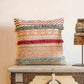 Placed on a traditional Rajasthani chest, the La La Land Cushion, a cotton handpainted and tufted accent pillow you can buy online at Sukham Home, a sustainable furniture, kitchen & dining and home decor store in Kolkata, India