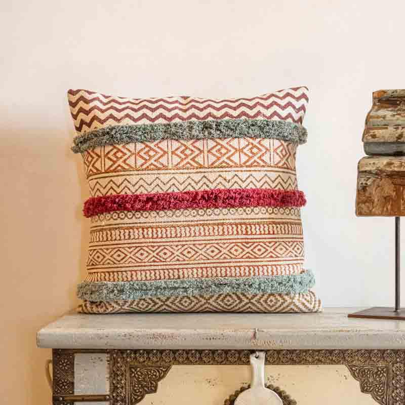 Placed on a traditional Rajasthani chest, the La La Land Cushion, a cotton handpainted and tufted accent pillow you can buy online at Sukham Home, a sustainable furniture, kitchen & dining and home decor store in Kolkata, India