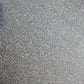 Close up of the grey texture on the Marvella Chair, a stone finish plastic outdoor furniture chair you can buy online at Sukham Home, a sustainable furniture, kitchen & dining and home decor store in Kolkata, India