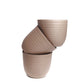 A stack of three brown mocha Verona, a round colourful indoor planter made from plastic that you can buy online at Sukham Home, a sustainable furniture, gardening and home decor store in Kolkata, India