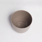 Top view of the brown mocha Verona, a round colourful indoor planter made from plastic that you can buy online at Sukham Home, a sustainable furniture, gardening and home decor store in Kolkata, India