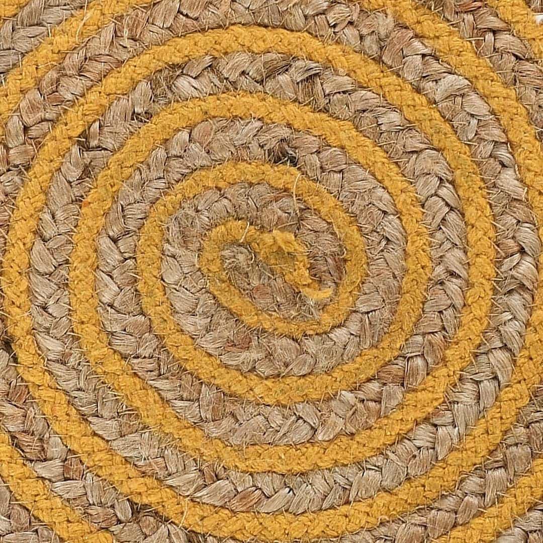 Close up of the design and texture of the Mustard Circle of Life Stool, a yellow ottoman made from jute, cotton and mango wood, available at Sukham Home, a sustainable furniture, kitchen & dining and home decor store in Kolkata, India